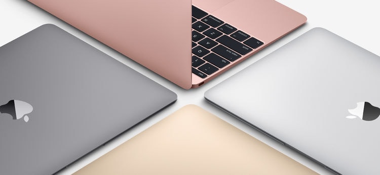 四种颜色的十二英寸 MacBook 交错摆放